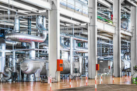 Equipment and piping as found inside of industrial thermal power plantの写真素材