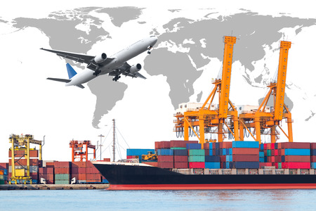 Container cargo freight ship with working crane loading bridge in shipyard for logistic Import export backgroundの写真素材