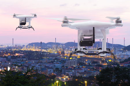 Pollution sensor drone flying to survey on industry zone, Technology 4.0 conceptのeditorial素材