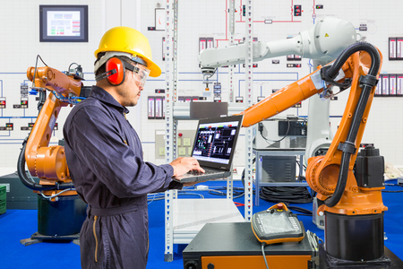 Engineer install and testing industry robotic in manufacturing of factoryの写真素材