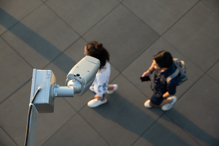 CCTV security camera surveillance the traveller on shopping areaの写真素材