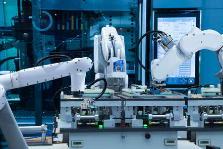 Automated robotic assembly electronic circuit board, Smart factory 4.0 conceptの写真素材