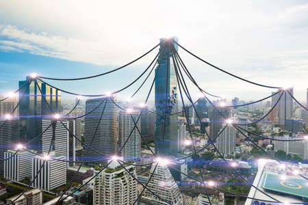 Cable networking connect technology abstract concept on city backgroundの写真素材