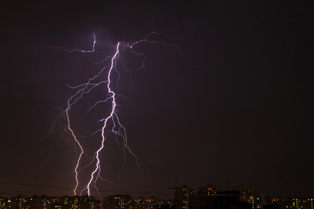 Lightning over the city during a night storm