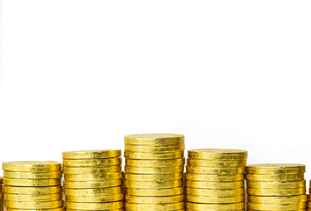 business concept with golden coin and white isolated background, which has clipping path.の写真素材