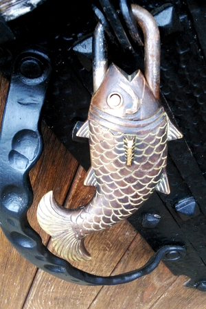 Exclusive iron lock in the form of fish.の写真素材