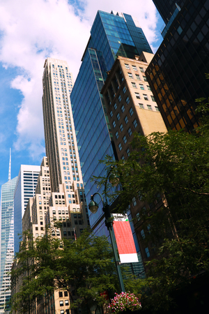 New York City Manhattan center with skyscrapers and blue sky at dayの写真素材
