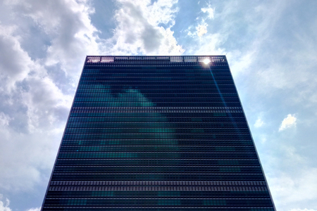 Skyscraper in NY on a sunny day against the sky