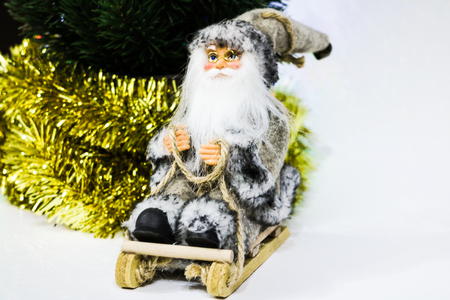 Happy Santa Claus Doll on Christmas time.colorful bokeh backgroundの写真素材