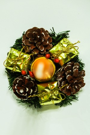 Festive Christmas and New Year handmade decoration candlestick with pine conesの写真素材