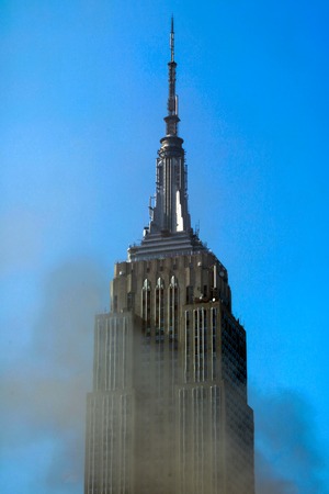 NEW YORK, USA - August 30, 2018: Top of The Empire State Building in Smokeのeditorial素材