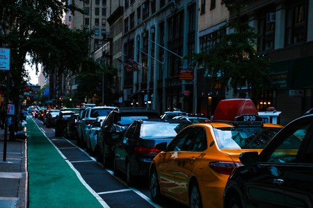 NEW YORK, USA - August 30, 2018: Empty Double Cycling Road in Manhattan New York with Bicycle Signs on Painted Asphaltのeditorial素材
