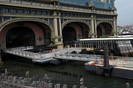 New York, USA - September 2, 2018: The Staten Island ferry docked in Staten Islandのeditorial素材