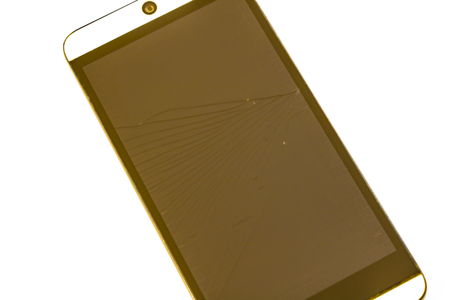 Smart phone with broken screen. isolated on white backgroundの写真素材