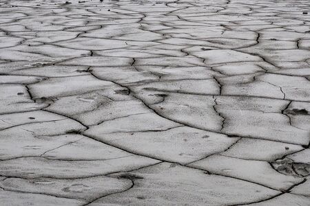 View of the cracked earth, out of focus, backgroundの写真素材