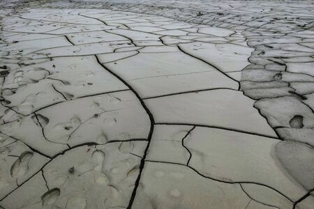 View of the cracked earth, out of focus, backgroundの写真素材