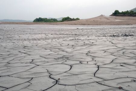 Dry soil background with deep cracks - environment conceptの写真素材