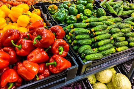 View on the shelf with vegetables in the store, food backgroundの写真素材