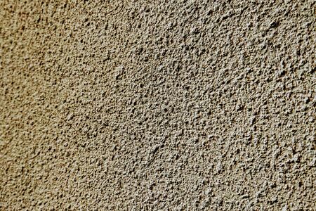 Texture of the wall of a building or structure, background, blank for designersの写真素材