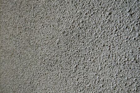 Texture of the wall of a building or structure, background, blank for designersの写真素材