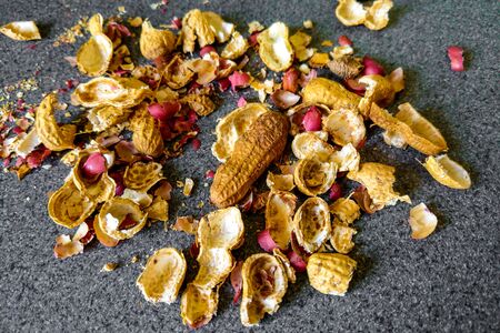 Peanut shell on the table, food backgroundの写真素材