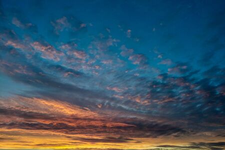 Beautiful sky at sunset, background, blank for designers, pink clouds at sunset, evening skyの写真素材