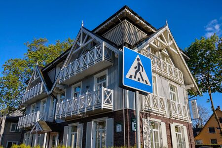 Druskininkai, Lithuania - May 10, 2019: Beautiful wooden house on a sunny dayのeditorial素材
