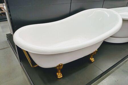 Modern white bath for the bathroomの写真素材