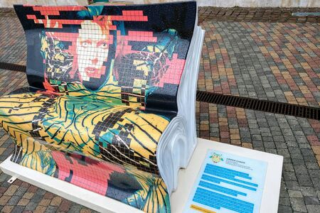 Krakow, Poland, May 23, 2019 beautiful painted benches near Galeria Kazimierzのeditorial素材