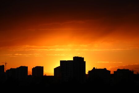 dark blue cloud with white light sky background and city light midnight evening timeの写真素材