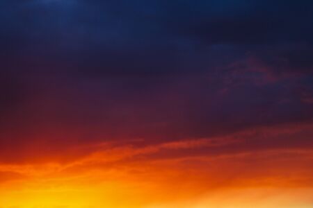 Dramatic field during sunset before a thunderstorm, nature backgroundの写真素材