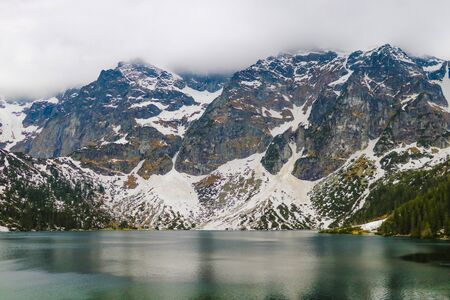 Sea Eye or Eye of the Sea Morskie Oko is the largest and fourth-deepest lake in the Tatra Mountains. Polandの写真素材