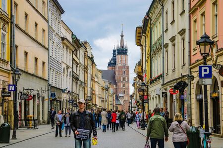 Krakow, Poland - May 21, 2019: Tourists walking through the old city of Krakowのeditorial素材
