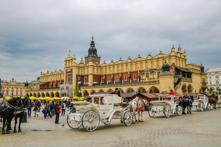 Krakow, Poland - May 21, 2019: Beautiful ensemble of Main Market Square with its medieval landmarksのeditorial素材
