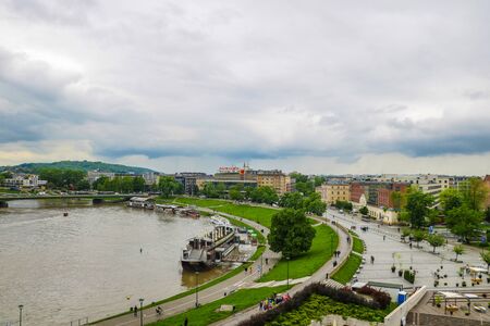 Krakow, Poland, 24 May 2019 - Picturesque landscape on coast river Wisla with boatsのeditorial素材