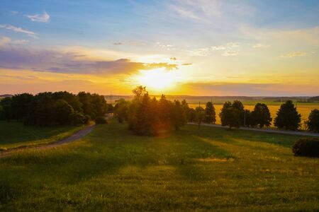 Sunset rural farm meadow horizon viewの写真素材