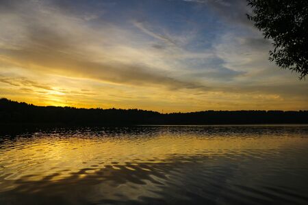 Sunset river water reflection landscape. River sunset reflection. Sunset river landscape. Sunset orange river viewの写真素材