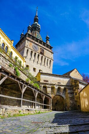 Sighisoara, Romania, May 11, 2019: Famous medieval fortified city and the Clock Tower built by Saxonsのeditorial素材