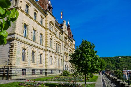 Sighisoara, Romania, May 13, 2019: A picturesque place near Sighisoara City Hall. From this place a beautiful view of the city opens. A popular place for tourists and a place for sunsetsのeditorial素材