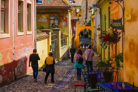 Sighisoara, Romania, May 14, 2019: Beautiful colorful street in Sighisoara in typical traditional styleのeditorial素材
