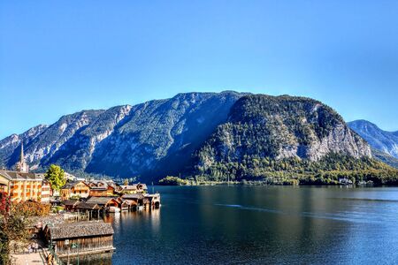 Hallstatt is a completely amazing town in Austria, hidden between the mountains and Lake Hallstatterseeの写真素材