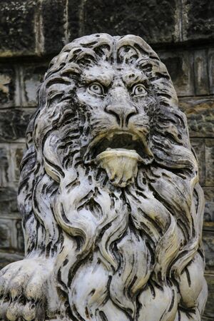 Sinaia, Romania, May 17, 2019: Marble sculpture. White stone lion. Architecture of the Middle Ages. European monuments An ancient attractionのeditorial素材