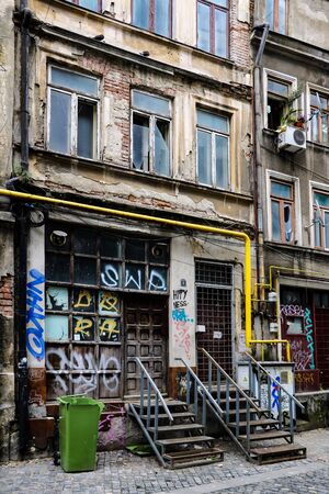 Bucharest, Romania, May 17 2019 Old houses with painted wallsのeditorial素材