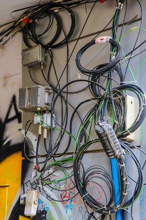 Bucharest, Romania, May 18, 2019: Many electricity internet and communications cables in Bucharestのeditorial素材