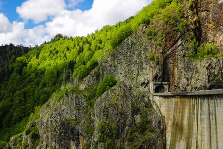 Vidraru Dam is a dam in Romania. It was completed in 1966 on the Arge River and creates Lake Vidraru. The arch dam was built with the primary purpose to produce hydroelectricityの写真素材