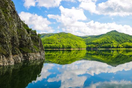View of Vidraru Dam is a dam in Romania. It was completed in 1966 on the Arge River and creates Lake Vidraru. The arch dam was built with the primary purpose to produce hydroelectricityの写真素材