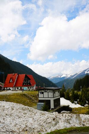 Dry grass and snow in Romania Transylvania spring or autumn seasonの写真素材