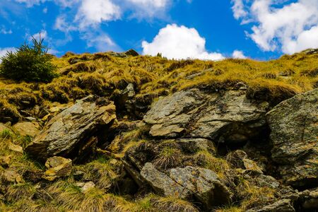 View of the cliffs or part of the mountains with blue sky, backgroundの写真素材