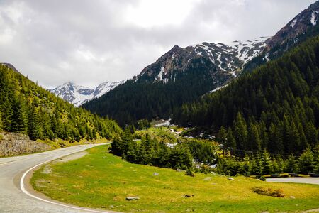 View of Transfagarash highway and valley in mountains of Romania. Tourist view mountain roadの写真素材