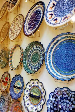 Wall view with beautiful multi-colored porcelain platesの写真素材